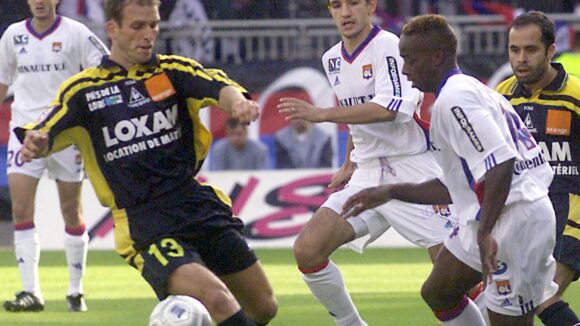 Sidney Govou et Eric Carrière lors d'OL - Nantes en septembre 2001